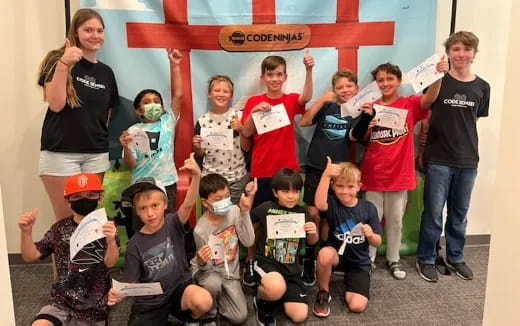 a group of people posing for a photo