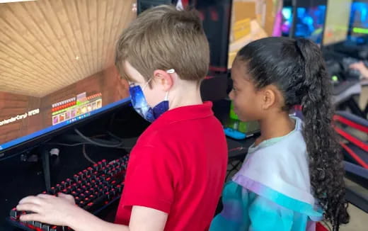 a man and a woman playing a video game