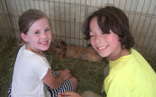 a boy and girl smiling