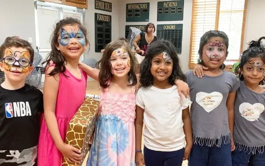 a group of people wearing face masks