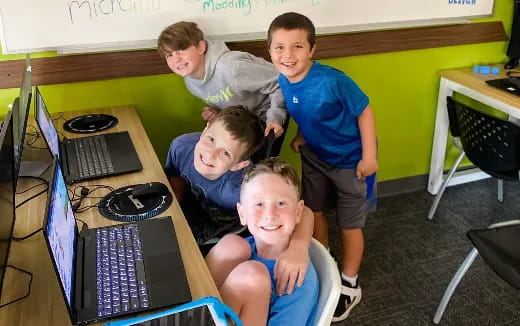 a group of boys posing for a picture