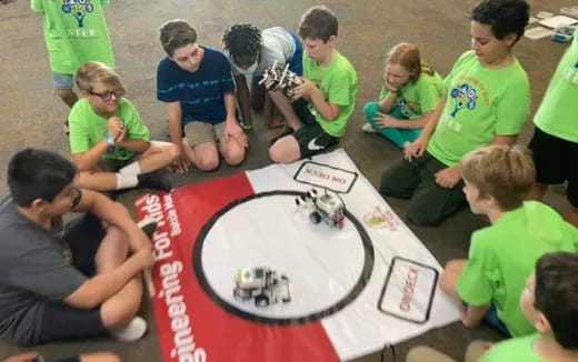 a group of people playing a board game