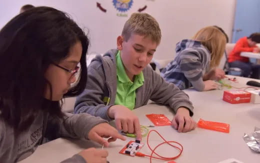 a person and a boy playing a game