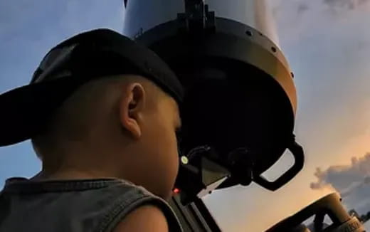 a person wearing a helmet and goggles