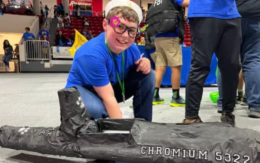 a person sitting on a tire