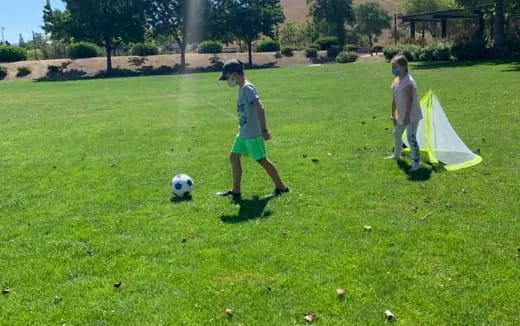 a couple of kids playing football