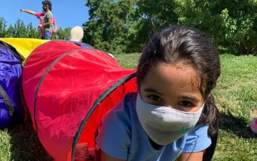 a girl wearing a mask