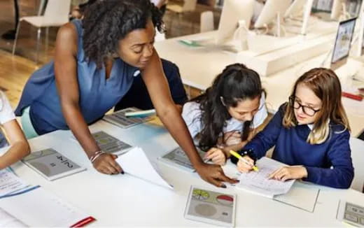 a few women studying at a table