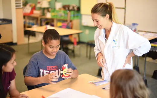 a person and a few children