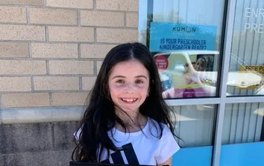 a person smiling for the camera