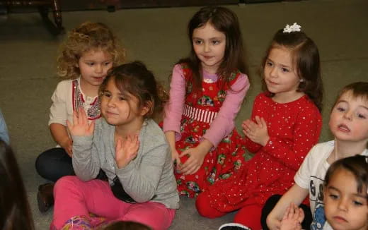 a group of children sitting together