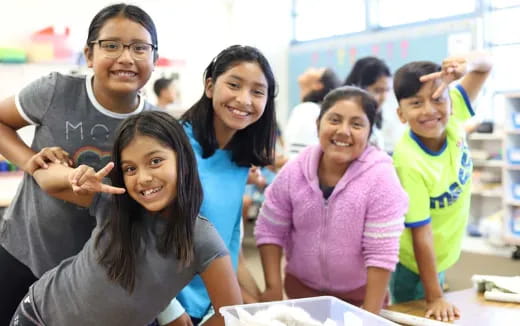 a group of people smiling