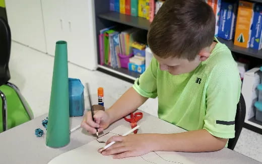 a young boy painting