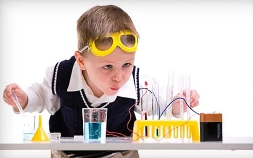 a young boy wearing goggles