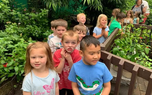 a group of children posing for a photo