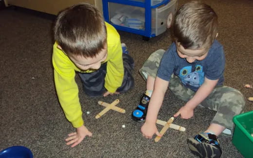 two children playing with toys