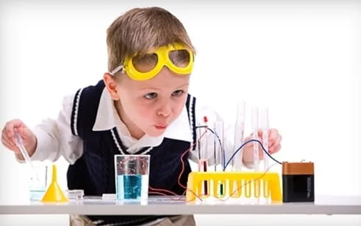 a young boy wearing goggles