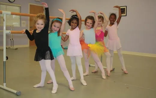 a group of girls posing for a picture