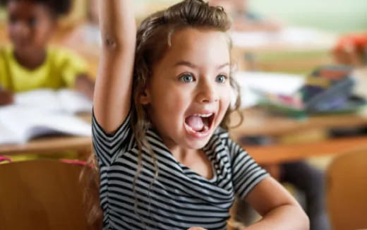 a girl with her arms up