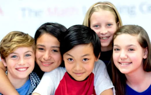a group of people posing for the camera