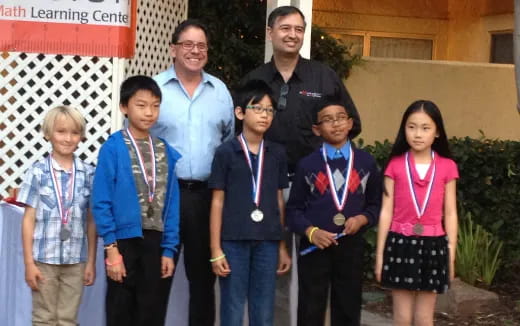 a group of people posing for a photo