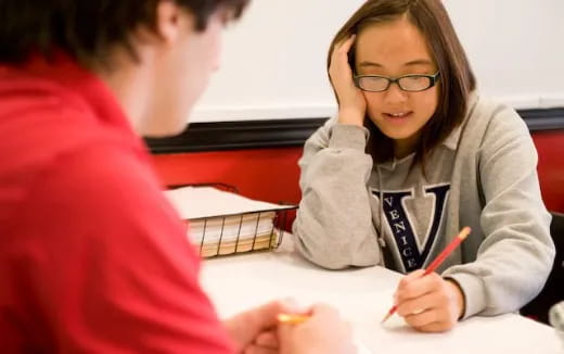 a person sitting at a table