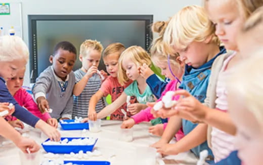 a group of people around a table