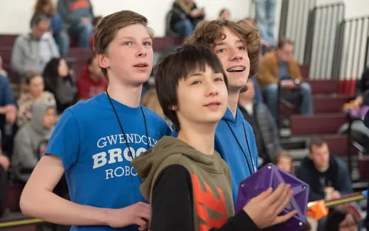 a group of boys posing for a picture