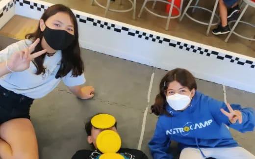 a couple of girls with paint on their faces