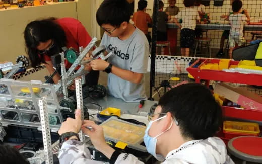 a group of people working in a store