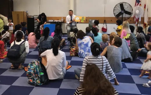 a group of people sitting in a room