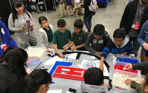 a group of people playing a board game