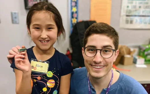 a person and a boy smiling