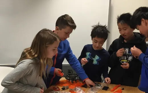 a group of people around a table