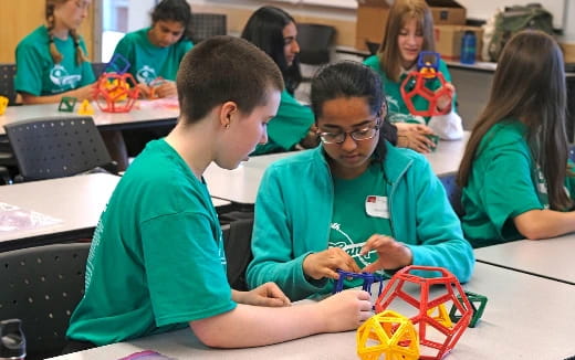 a group of children playing with toys