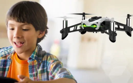 a boy holding a toy gun