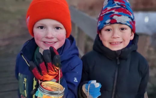 two children wearing winter clothes