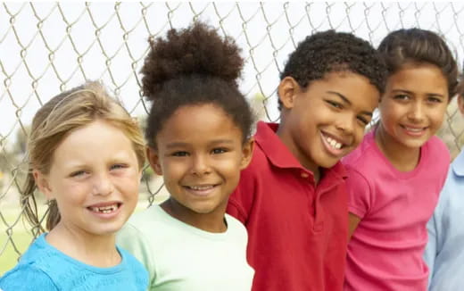 a group of children smiling