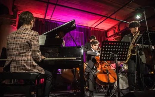 a group of people playing instruments