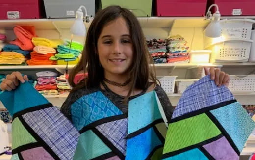 a person holding a shopping bag