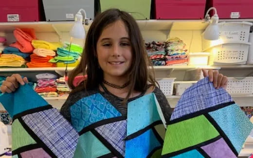 a person holding a shopping bag