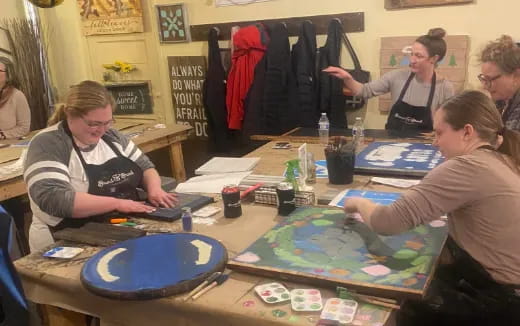 a group of people playing a board game