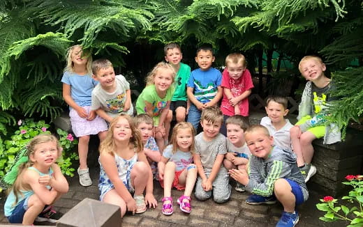 a group of children posing for a photo