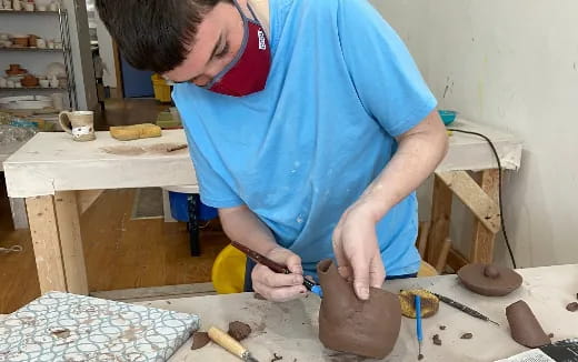 a person painting a table