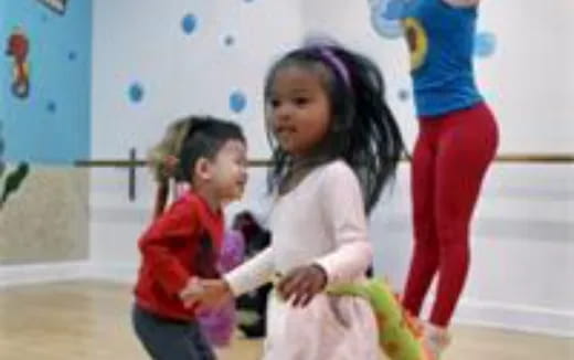 a group of children dancing