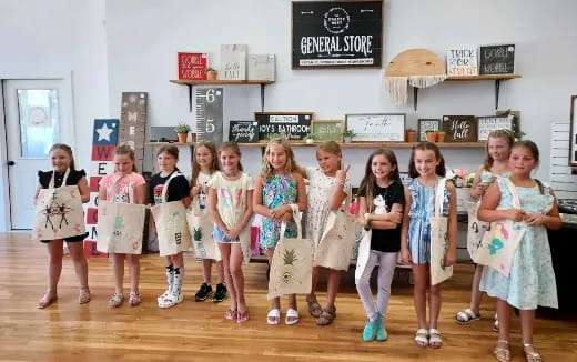 a group of girls posing for a photo