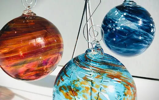 a group of glass ornaments