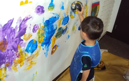 a child painting a picture