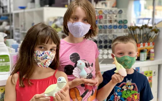 a group of children with painted faces