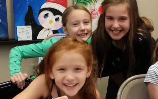 a group of people posing for the camera